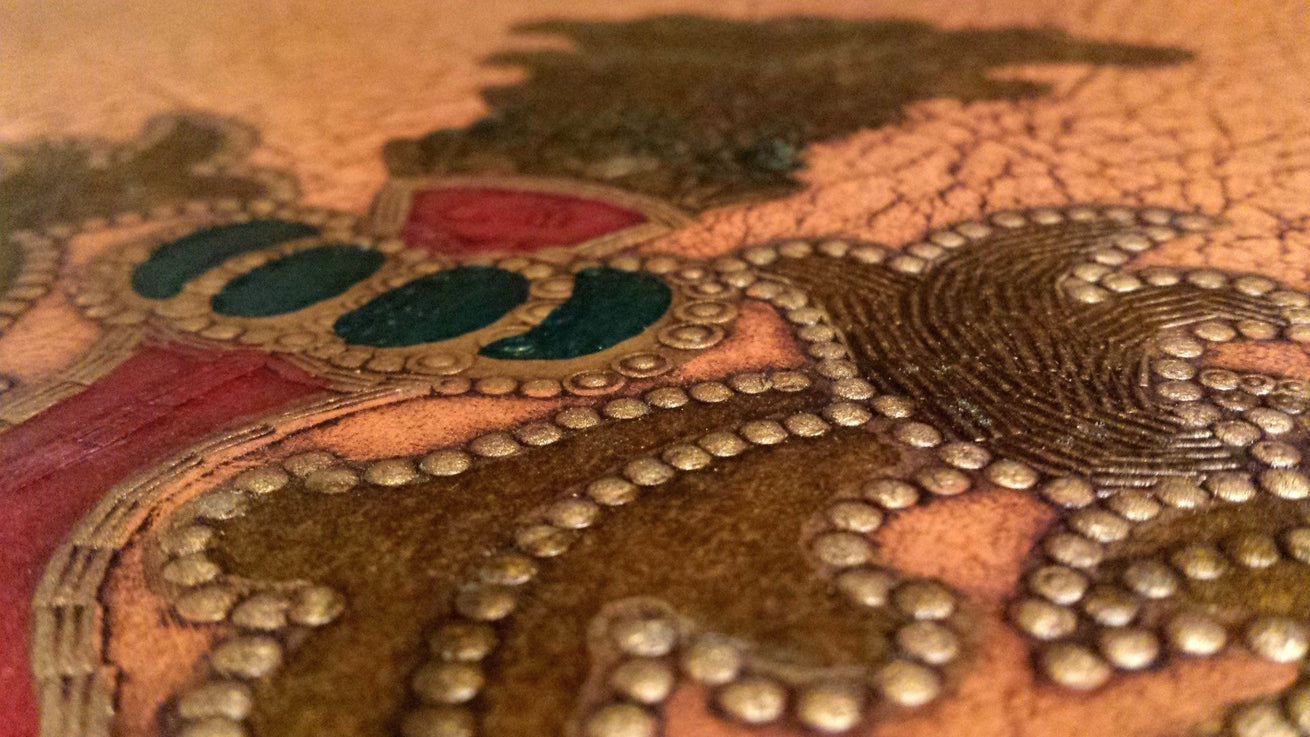 Embossed Heraldic Ornament on Leather - Antique Wallpaper Remnant
